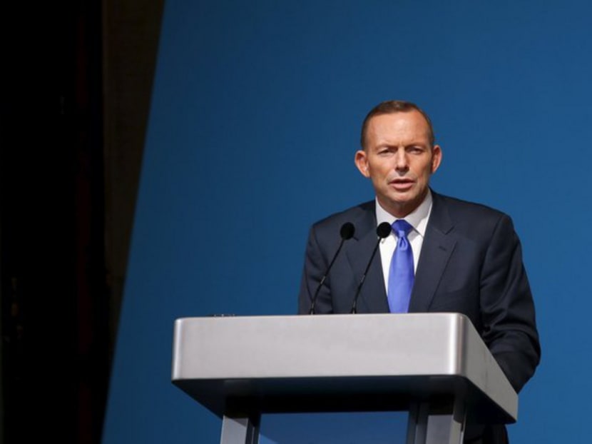 Australia's Prime Minister Tony Abbott delivers a lecture on "Our Common Challenges: Strengthening Security in the Region" in Singapore. Photo: Reuters