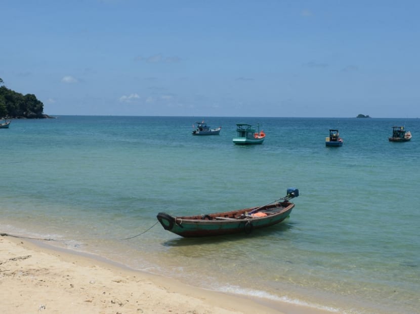 This picture taken on April 11, 2017 shows tourist boats anchored at a beach in Phu Quoc island in southern Vietnam. This picture taken on April 11, 2017 shows tourist boats anchored at a beach in Phu Quoc island in southern Vietnam.