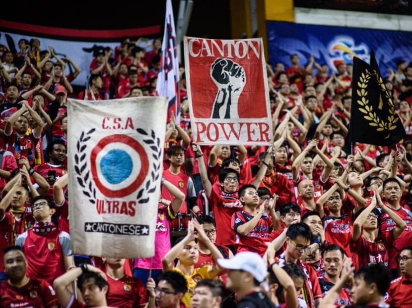 Guangzhou fans unfurled a "Annihilate British Dogs" banner during the club's Asian Champions League match against Hong Kong champions Eastern. Photo: AFP