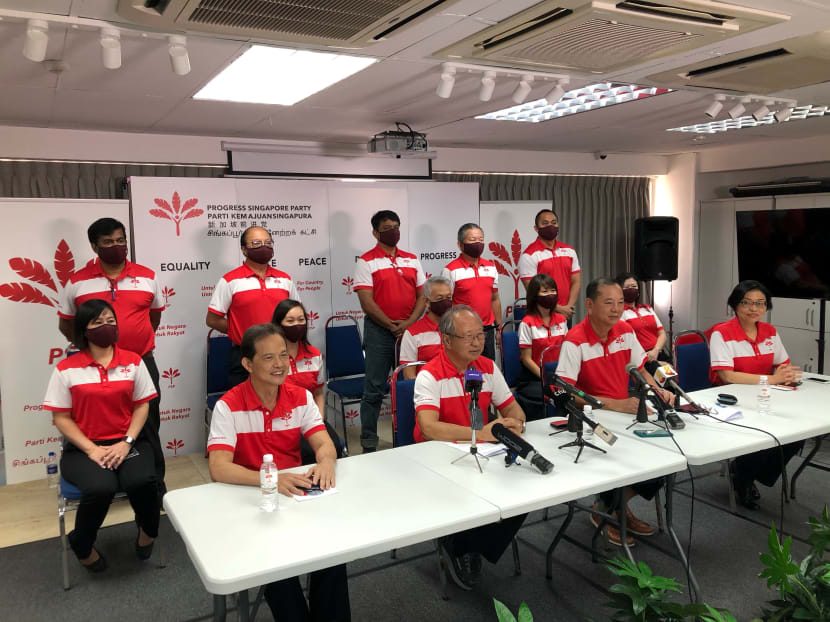 The 14 members of the Progress Singapore Party's central executive committee at a press conference on April 3, 2021. In the first row (from left to right) are Mr Leong Mun Wai, Dr Tan Cheng Bock, Mr Francis Yuen and Ms Hazel Poa.