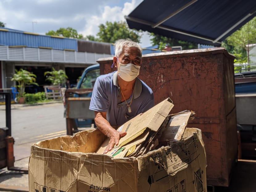 A rag-and-bone man sorting out his cardboard at Ang Mo Kio Industrial Park 2 on July 30, 2020. A rag-and-bone man sorting out his cardboard at Ang Mo Kio Industrial Park 2 on July 30, 2020.