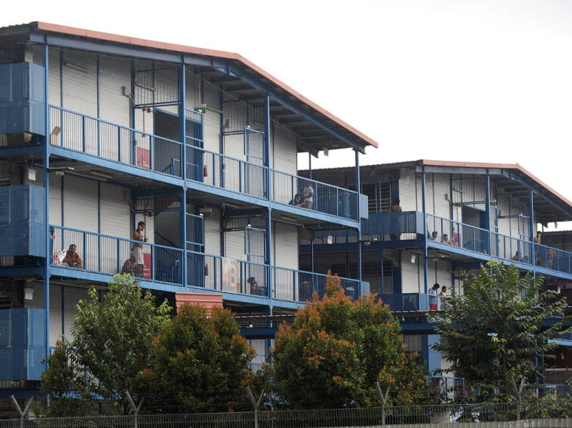 Workers living in S11 Dormitory in Punggol were seen hanging out at common areas on April 6, 2020. The dormitory was gazetted as an “isolation area” with all workers living there under quarantine, after a spike in the number of cases of Covid-19 infection from the residence.