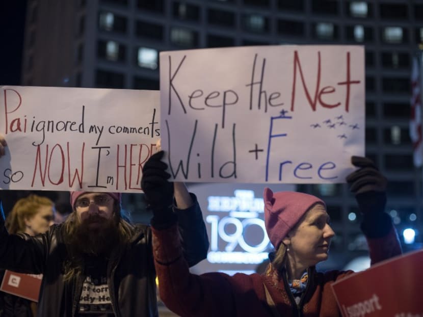 Protestors supporting net neutrality rally against a plan by Federal Communications Commission (FCC) to roll back rules that ensure equal access to the Internet. Online companies warn that the move would fundamentally change the way the Internet is experienced. Photo: AFP