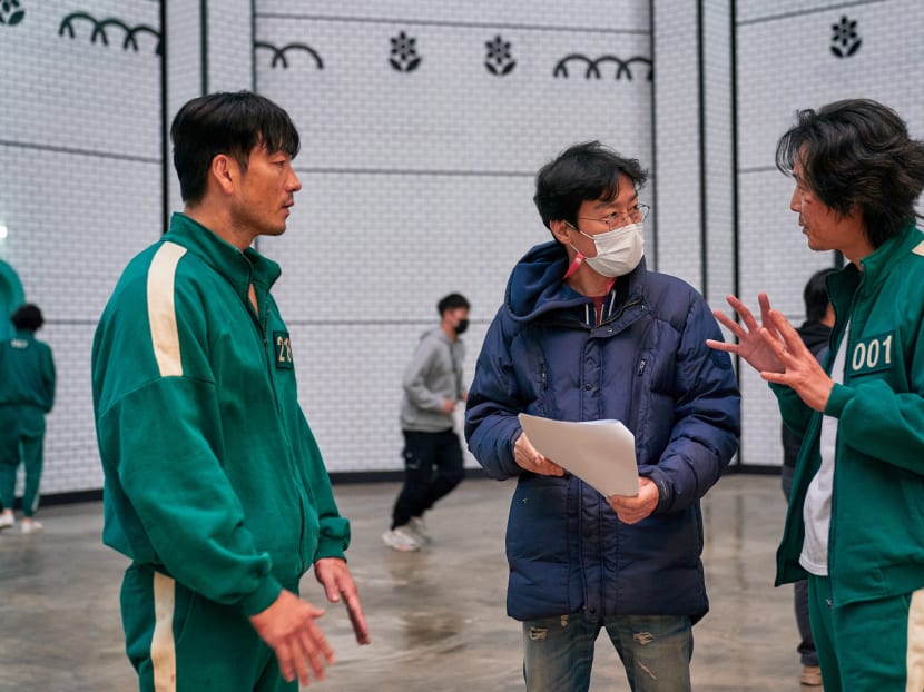 Director Hwang Dong-hyuk's (centre) television debut last month was a worldwide success, becoming Netflix's most popular series at launch, drawing at least 111 million watchers.