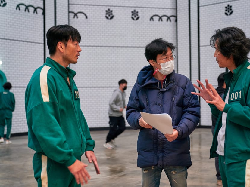 Director Hwang Dong-hyuk's (centre) television debut last month was a worldwide success, becoming Netflix's most popular series at launch, drawing at least 111 million watchers. Director Hwang Dong-hyuk's (centre) television debut last month was a worldwide success, becoming Netflix's most popular series at launch, drawing at least 111 million watchers.
