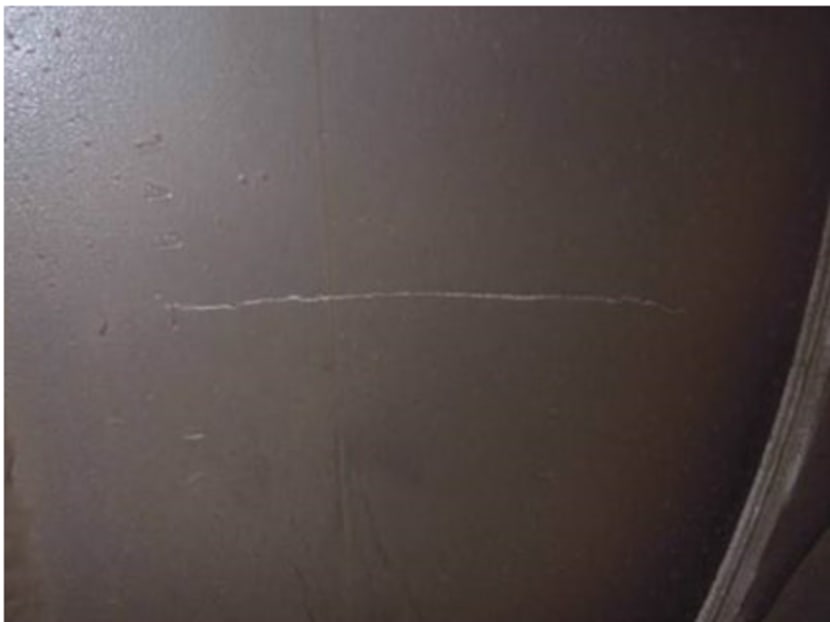 An example of a 142mm hairline crack found.  Photo: Land Transport Authority