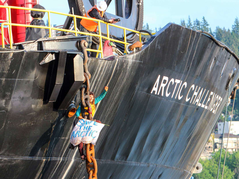 Gallery: 2 people chained to Shell ship north of Seattle