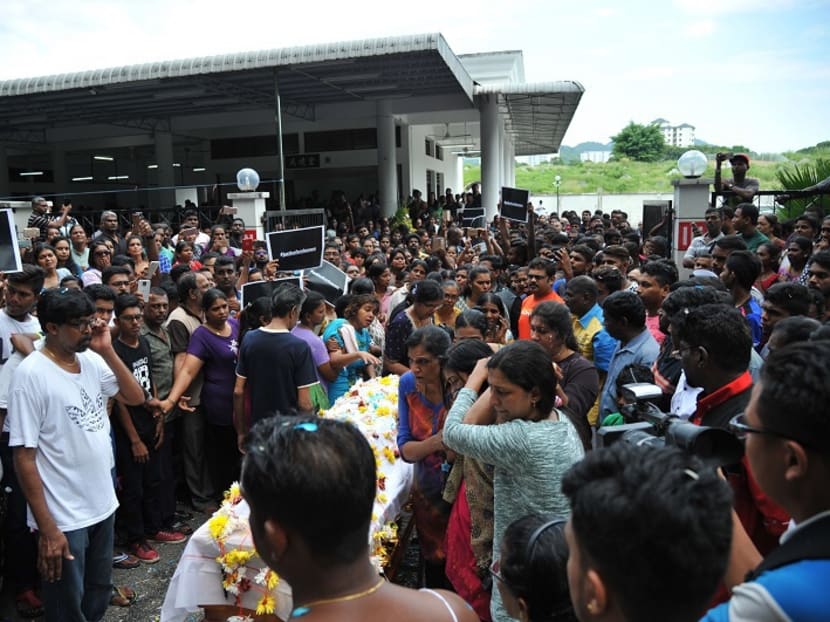Family members sending T. Nhaveen off at the funeral in Batu Gantung. Photo: The Malay Mail Online