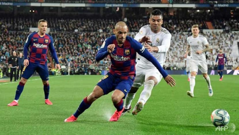 Football: Real Madrid defeat Barcelona in Clasico to regain top spot in La Liga Football: Real Madrid defeat Barcelona in Clasico to regain top spot in La Liga