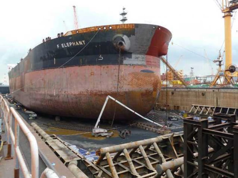Overview of the accident scene within the dry dock of Jurong Shipyard. The boom of the cherry picker buckled and collapsed on Oct 29, 2011, causing 2 workers to plunge 30m to their deaths. Photo: Ministry of Manpower