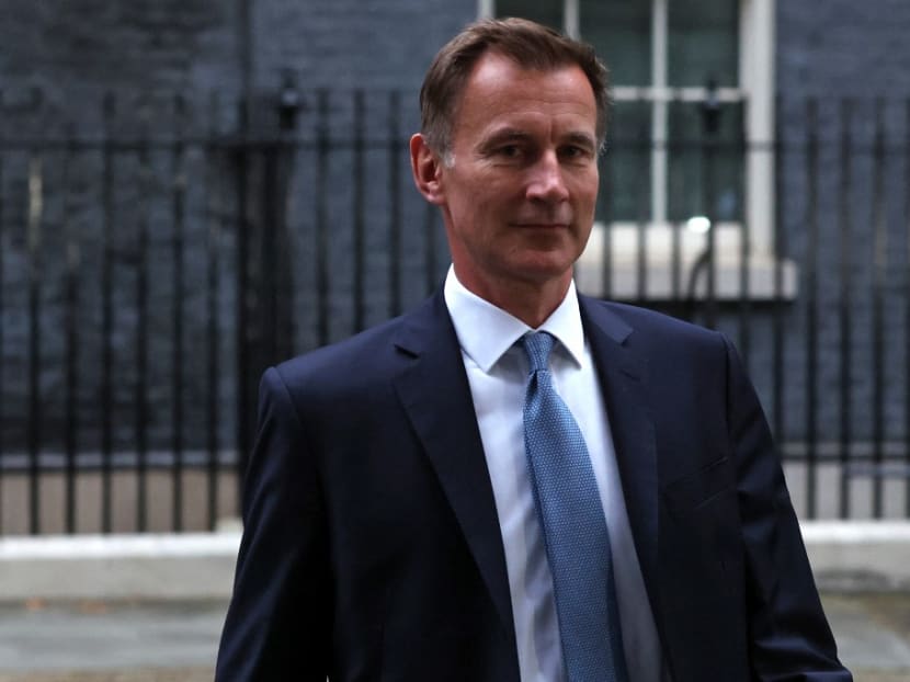 Britain's Chancellor of the Exchequer Jeremy Hunt leaves 10 Downing Street in central London on Oct 14, 2022, after having a meeting with Britain's Prime Minister Liz Truss.