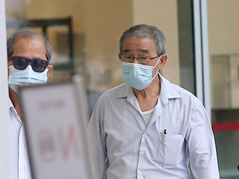 Lim Ah Bah (right) at State Courts on Aug 5, 2021. The TCM practitioner was found guilty of molesting a patient.