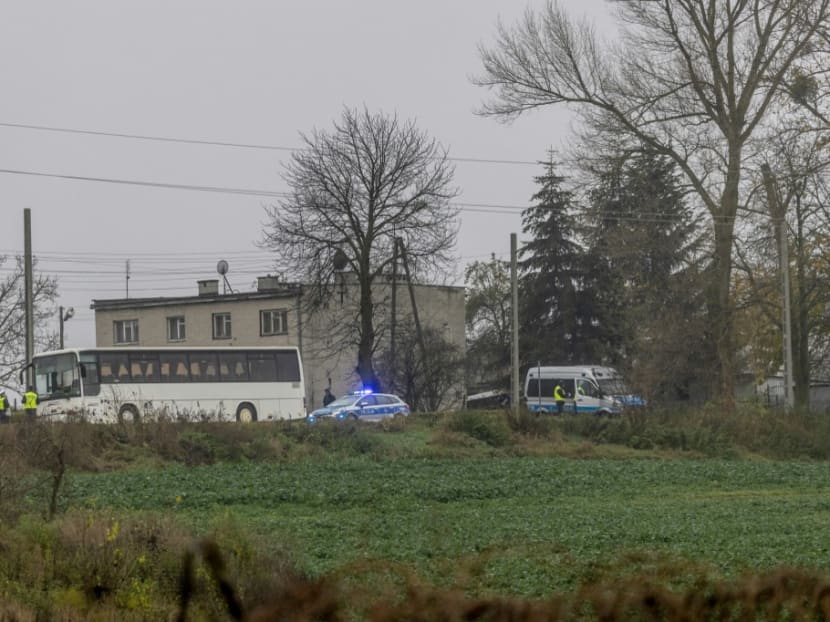 Police investigate on Nov 16, 2022 the site where a missile strike killed two men in the eastern Poland village of Przewodow, near the border with war-ravaged Ukraine. 