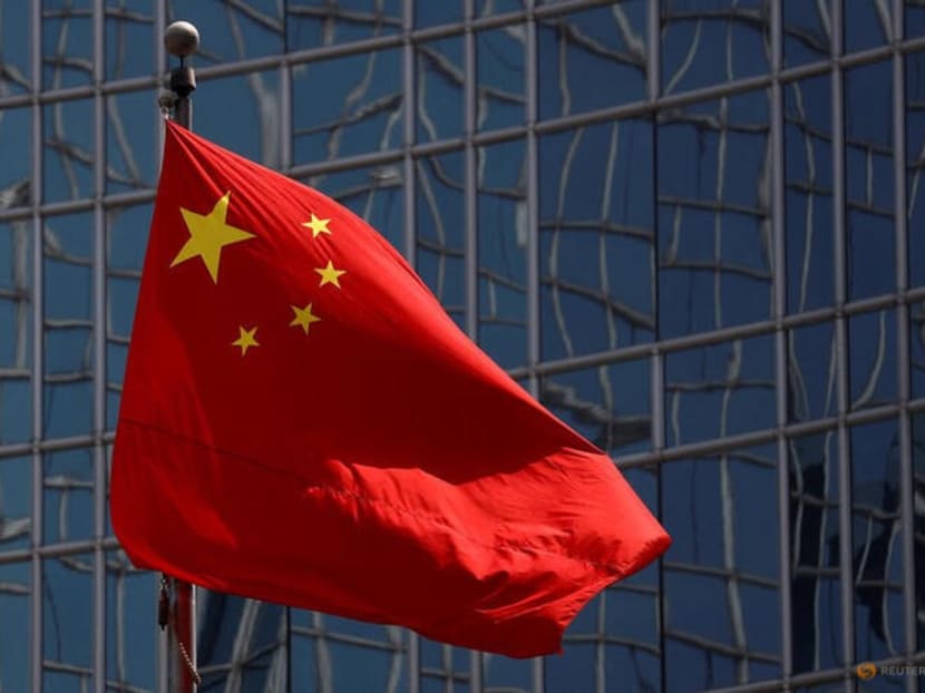 FILE PHOTO: The Chinese national flag is seen in Beijing, China April 29, 2020. REUTERS/Thomas Peter FILE PHOTO: The Chinese national flag is seen in Beijing, China April 29, 2020. REUTERS/Thomas Peter