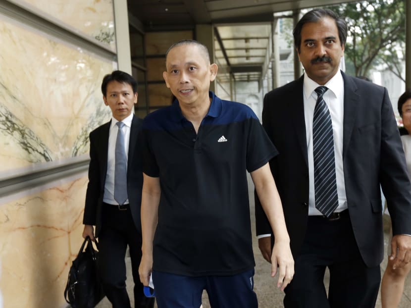 Dan Tan (centre) leaving the Supreme Court. He was released after a two-year detention under the CLTPA. He had challenged his continued detention and succeeded at his second attempt. Photo: Ernest Chua Dan Tan (centre) leaving the Supreme Court. He was released after a two-year detention under the CLTPA. He had challenged his continued detention and succeeded at his second attempt. Photo: Ernest Chua