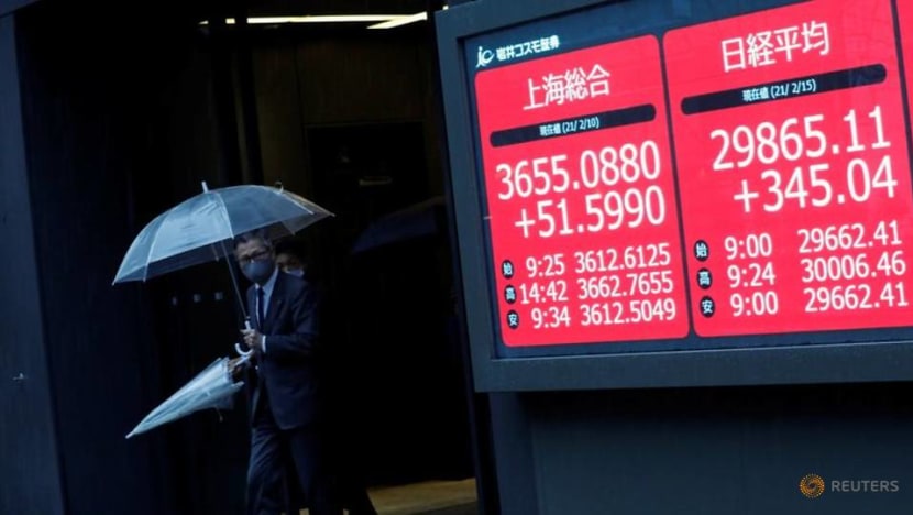 Tokyo's Nikkei closes above 30,000, first time since 1990