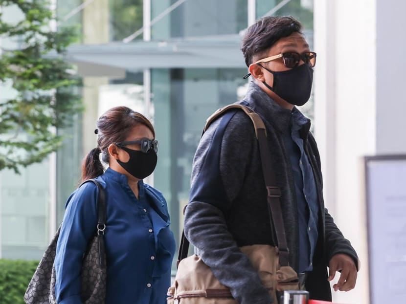 Noorain Jubli (left) and Khairul Annuar Zakaria (right) arriving at the State Courts in April 2021.