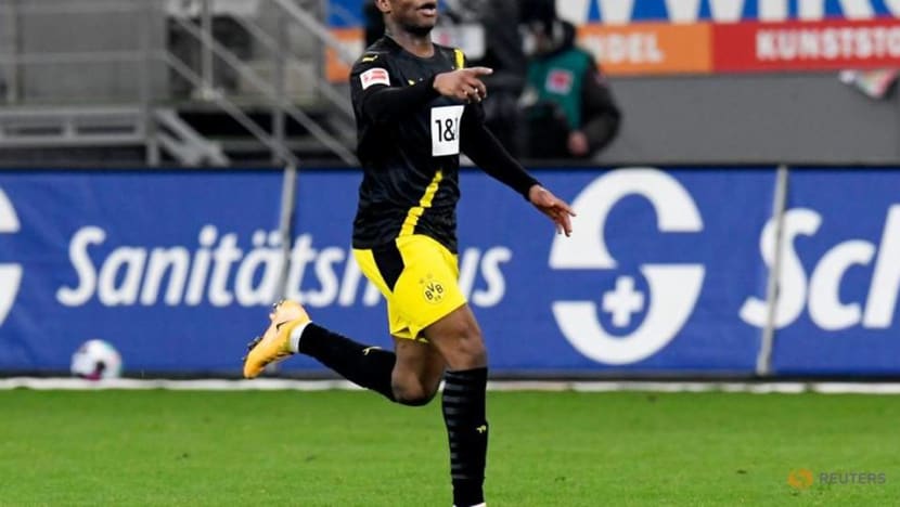 Football: Dortmund slip up 2-1 in Freiburg to continue rollercoaster season Football: Dortmund slip up 2-1 in Freiburg to continue rollercoaster season