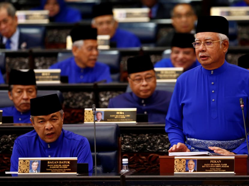 Prime Minister Najib Razak (right) beside his deputy Ahmad Zahid Hamidi in Parliament.  The author says BN’s strategy to create disillusionment with the opposition will increase closer to polling date.