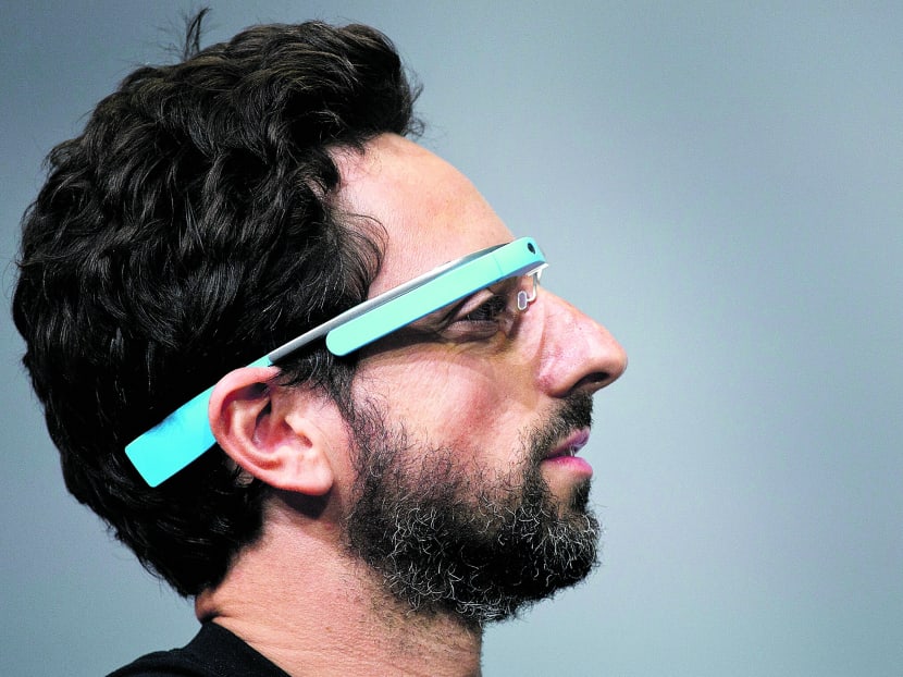 Google has developed glasses (as modelled by co-founder Sergey Brin) that incorporate a computer screen and camera. Photo: BLOOMBERG