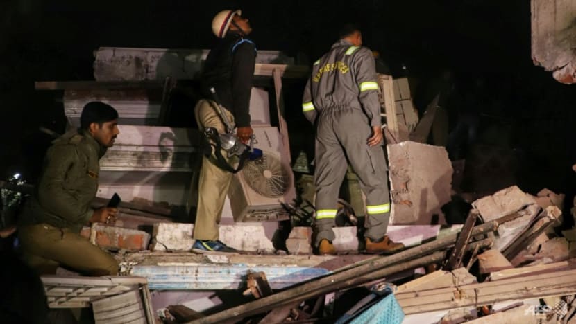 At least 3 dead, dozens trapped as building collapses in India At least 3 dead, dozens trapped as building collapses in India