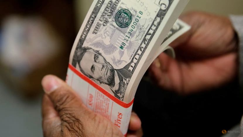 Dollar eyes third weekly gain on higher US rate expectations