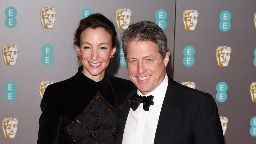 Hugh Grant Reacts To Claim He Married Wife For ‘Passport Reasons”