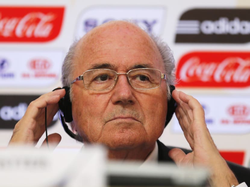 The Coca-Cola Co called for FIFA's President Sepp Blatter to step down immediately following Swiss authorities saying they were opening a criminal investigation into the head of the world soccer body. Photo: Reuters