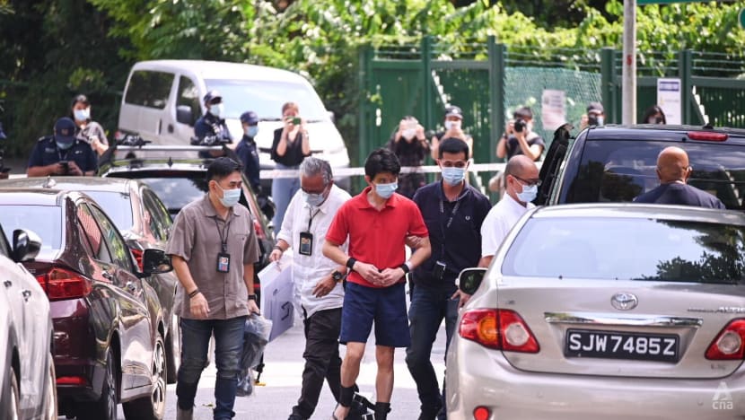 Upper Bukit Timah deaths: Father of 11-year-old boys taken by police to canal where bodies were found Upper Bukit Timah deaths: Father of 11-year-old boys taken by police to canal where bodies were found