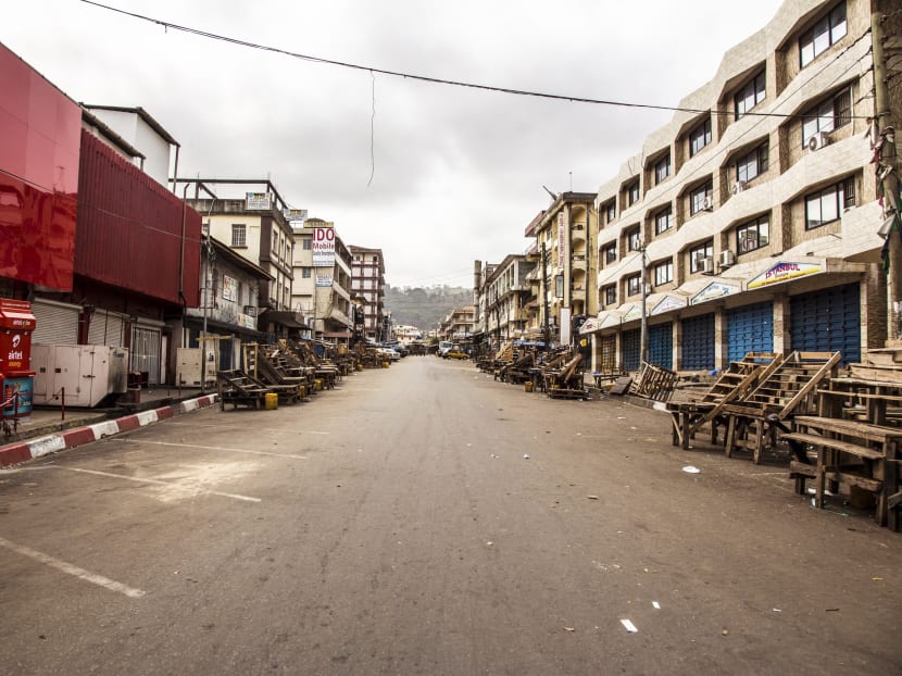 In this file photo dated Friday, March 27,  2015, a usually busy street is deserted as Sierra Leone enters a three day country wide lockdown on movement of people due to the Ebola virus in the city of Freetown, Sierra Leone. Photo: AP