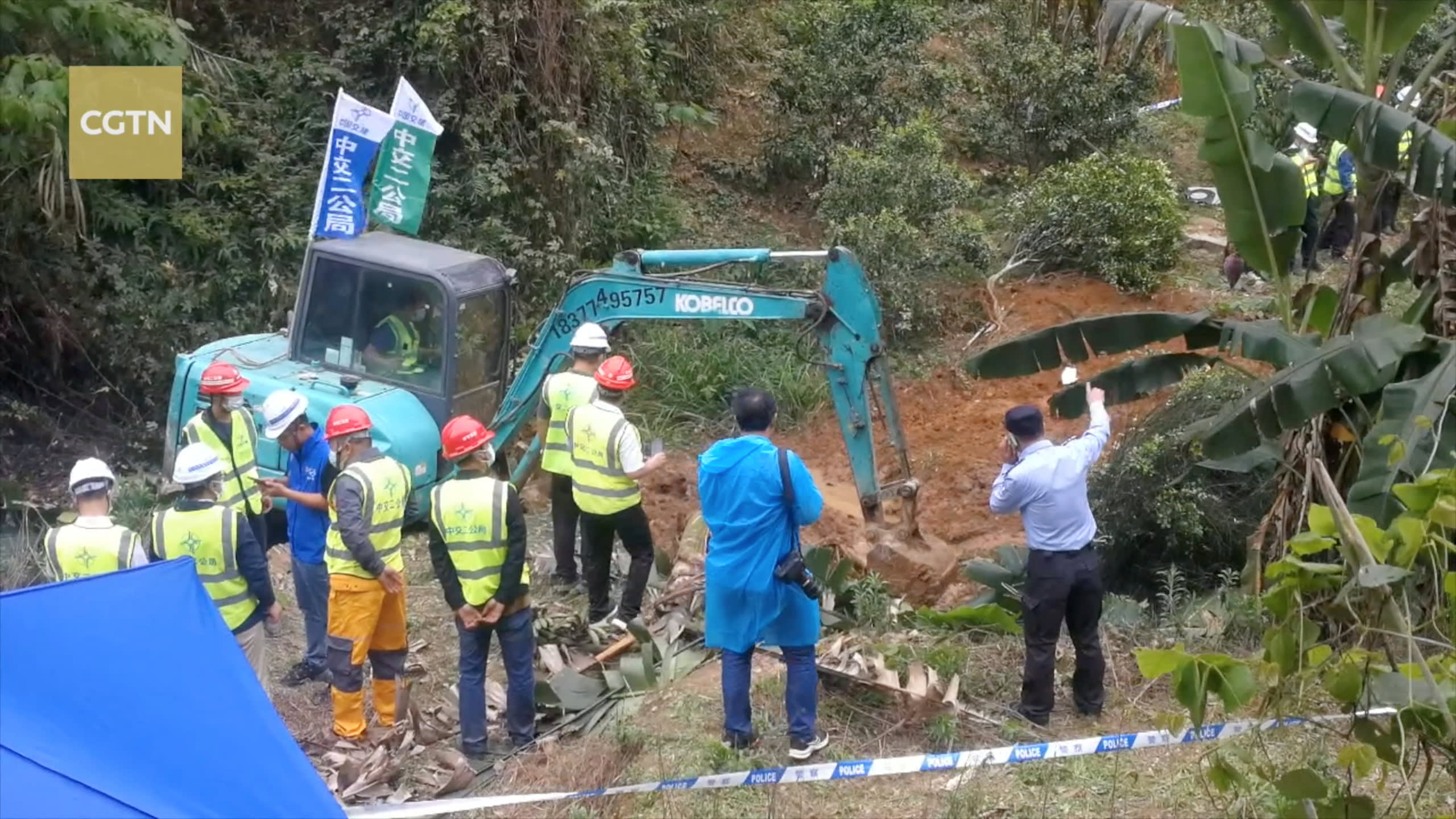 Rescuers work at the site where a China Eastern Airlines Boeing 737-800 plane, flight MU5735, crashed in Wuzhou,China, on March 22, 2022.