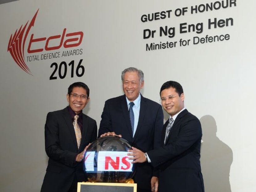 Minister for Defence Ng Eng Hen (centre) with Senior Minister of State (Defence) Mohamad Maliki Bin Osman (left) and Senior Minister of State (Home Affairs) Desmond Lee officially launching the NS Mark at the Total Defence Awards 2016.  Photo: Mindef