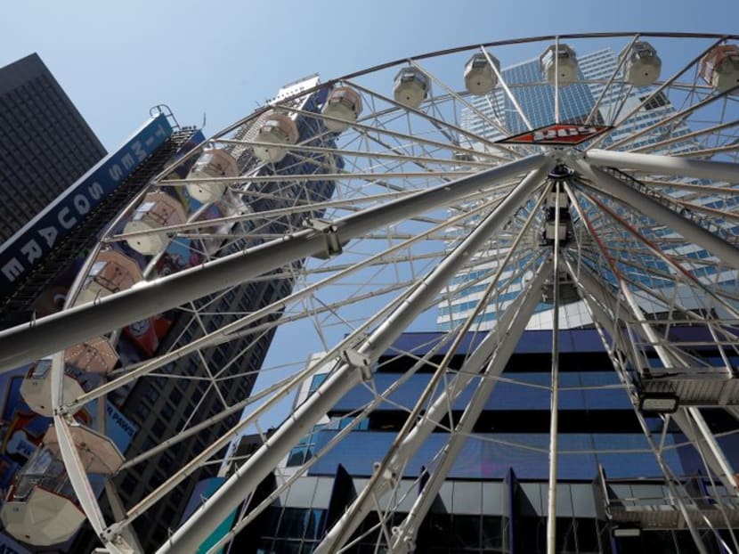 A Ferris wheel lifts spirits in New York's Times Square