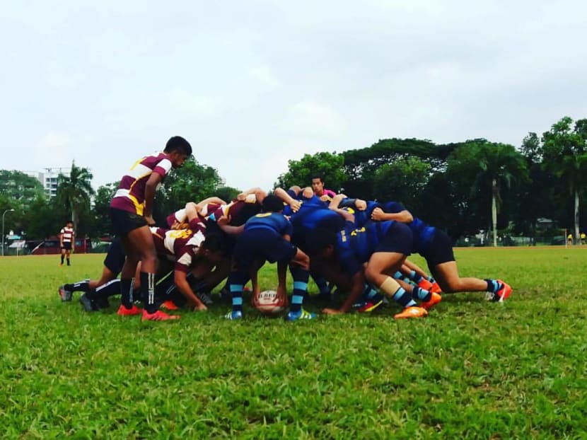 Montfort Secondary School's 'B' Division rugby team (in blue) in action at the National inter-school competition in 2017. Photo: Facebook / Montfort Rugby