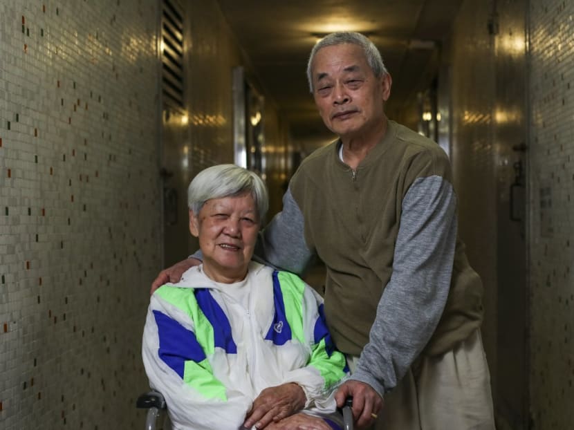 Mdm Fong Yuk-kwan (left) and her husband Mr Ho Foon, who is her sole care giver.