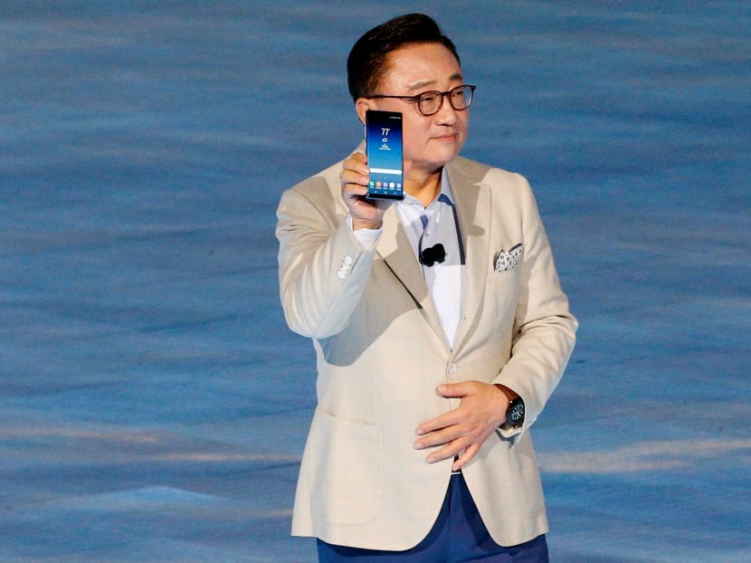 Koh Dong-jin, president of Samsung Electronics' Mobile Communications, shows the Galaxy Note 8 smartphone during the launch event in New York City, US, on Aug 23, 2017. Photo: REUTERS