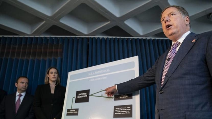 Trump denies knowing Giuliani associates charged with trying to influence US elections Trump denies knowing Giuliani associates charged with trying to influence US elections