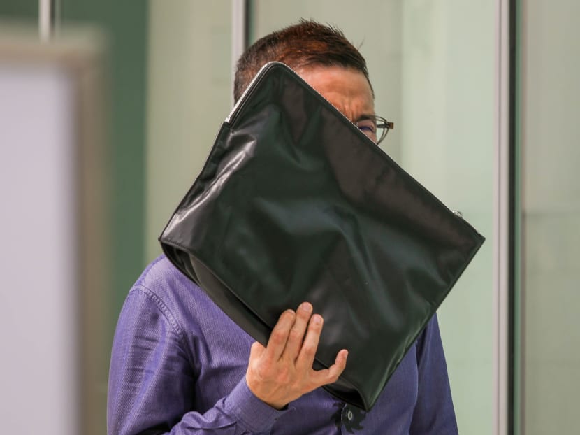 Former HDB director charged with taking obscene videos, photos of men in Safra locker rooms, condo