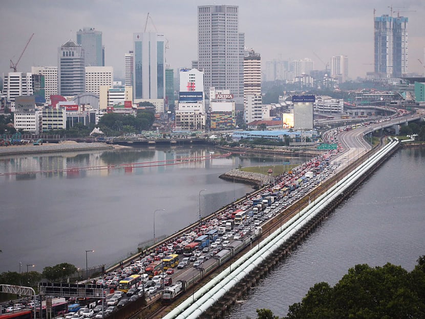 Johor Chief Minister Osman Sapian said the crooked bridge would help ease congestion into Singapore and reduce pollution in the Tebrau Straits. Johor Chief Minister Osman Sapian said the crooked bridge would help ease congestion into Singapore and reduce pollution in the Tebrau Straits.