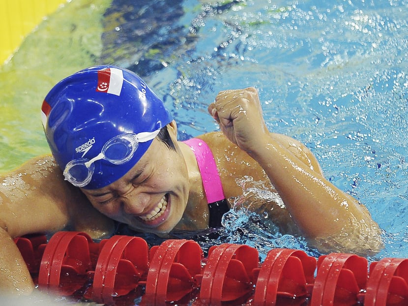 Tao Li after winning the bronze in the women’s 100m butterfly. Photo: Singapore National Olympic Council