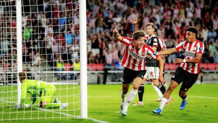 Football: PSV scrape past Basel with two late goals Football: PSV scrape past Basel with two late goals