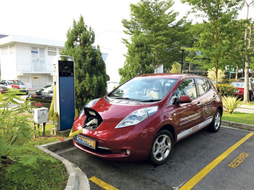 A car being charged at a charging station at the Energy Market Authority at Alexandra. Photo: Bosch