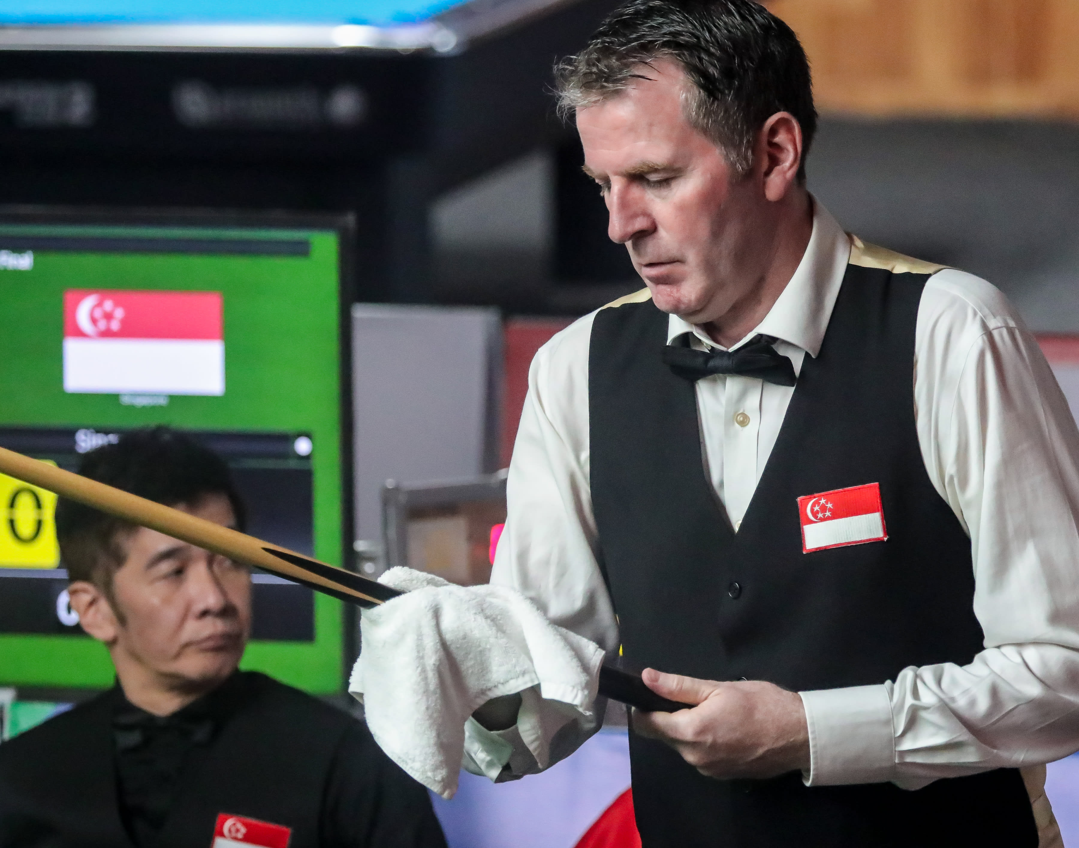 Peter Gilchrist and Alex Puan win the English billiards doubles event at the 31st SEA Games. 