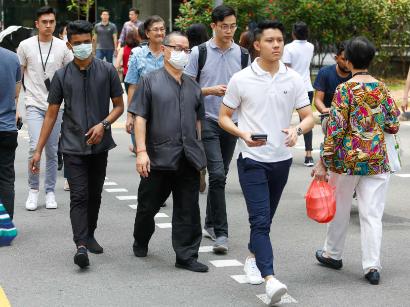Office workers around the Central Business District on March 27, 2020 Office workers around the Central Business District on March 27, 2020