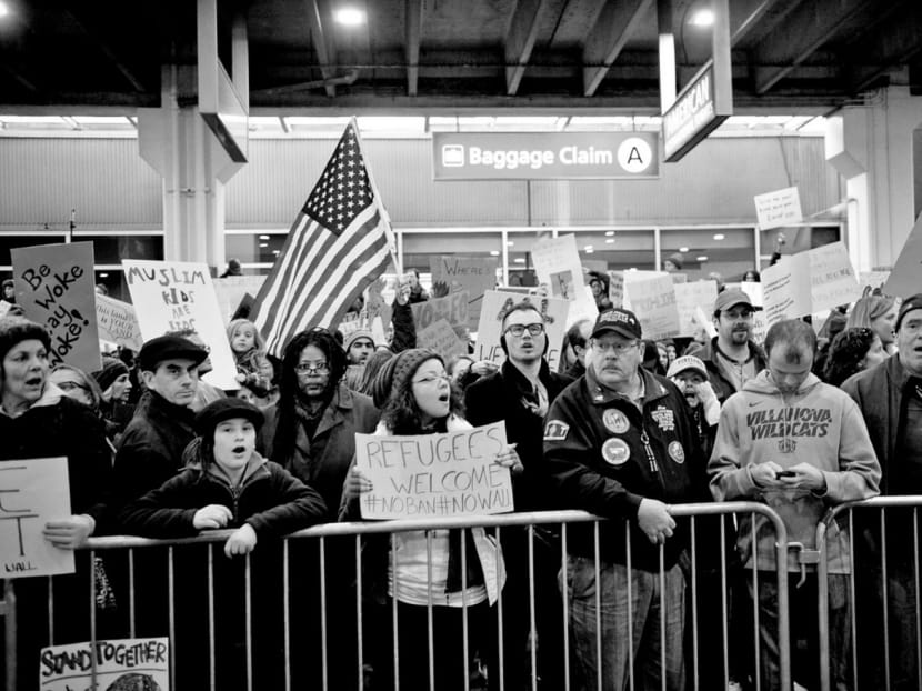 Demonstrators protesting against President Donald Trump’s travel ban outside Philadelphia International Airport in Philadelphia, Pennsylvania.

Photo: Reuters