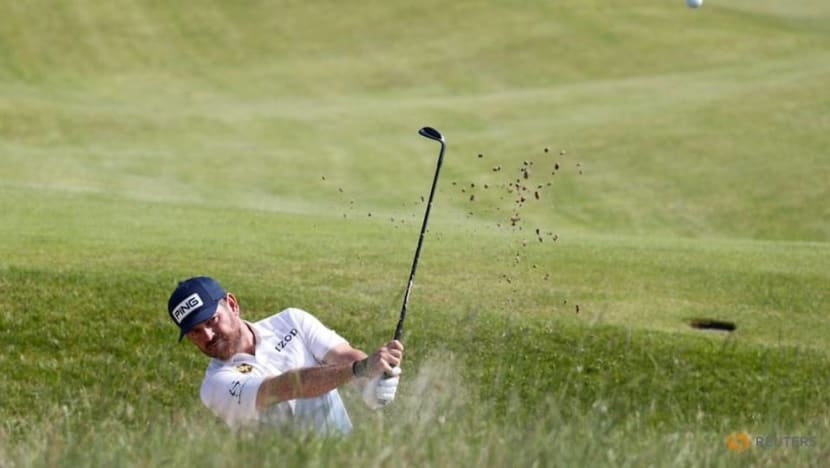 Golf-Defending champion Lowry grouped with Rahm in Open first round Golf-Defending champion Lowry grouped with Rahm in Open first round