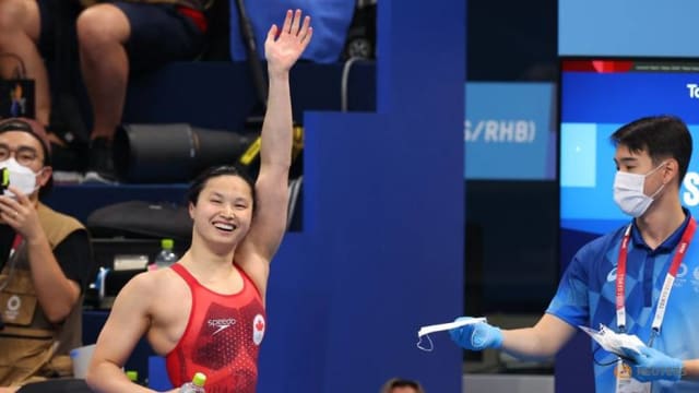 女泳将为加拿大夺首金 出生中国由加国夫妇领养