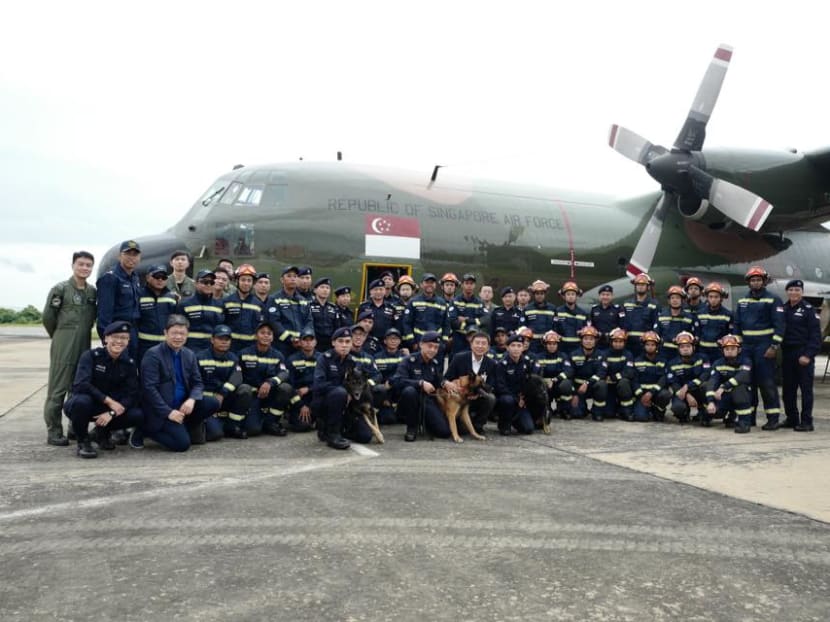 Photo of the day: A contingent of Home Team officers posing in front of their aircraft after touching down safely at Pakse International Airport in Laos on Monday (Aug 13). The contingent, with their equipment and supplies, is now on its way to Attapeu province to provide aid for those affected by the flooding caused by a recent dam collapse. Photo: Singapore Police Force/Facebook