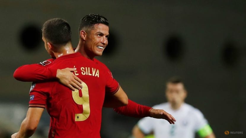 Football: Ronaldo claims world record with late late show Football: Ronaldo claims world record with late late show