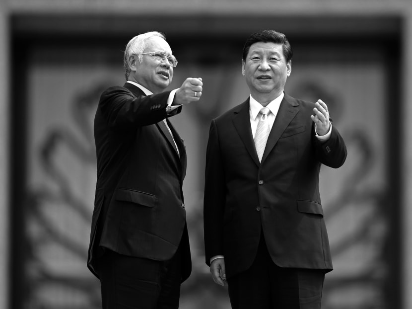 Chinese President Xi Jinping with Malaysian Prime Minister Najib Razak in Putrajaya last Friday. Mr Xi promised to accelerate trade and investment during his visit. Photo: Reuters